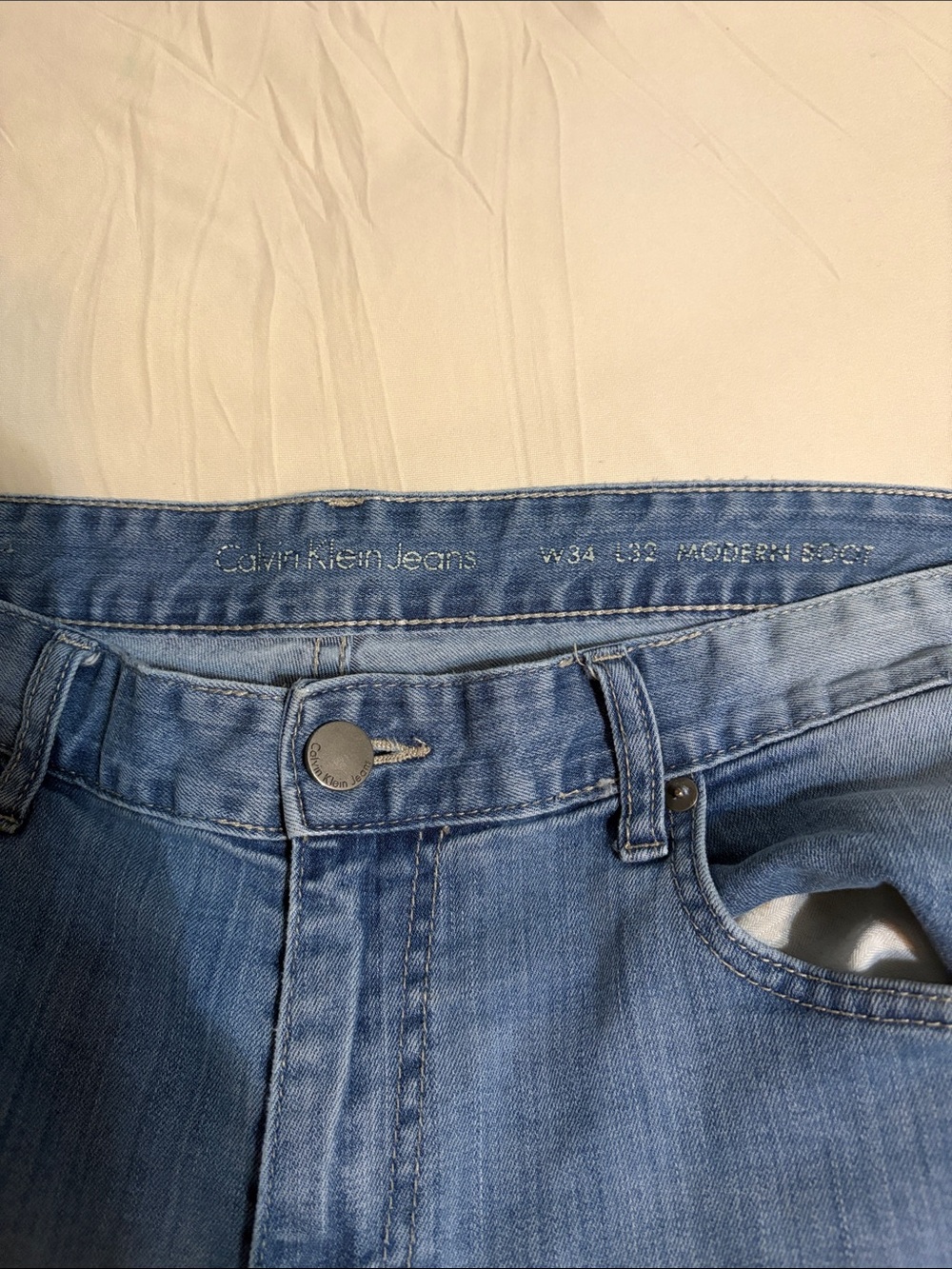 Calvin Klein Men’s Light Blue High-Rise Bootcut Jeans